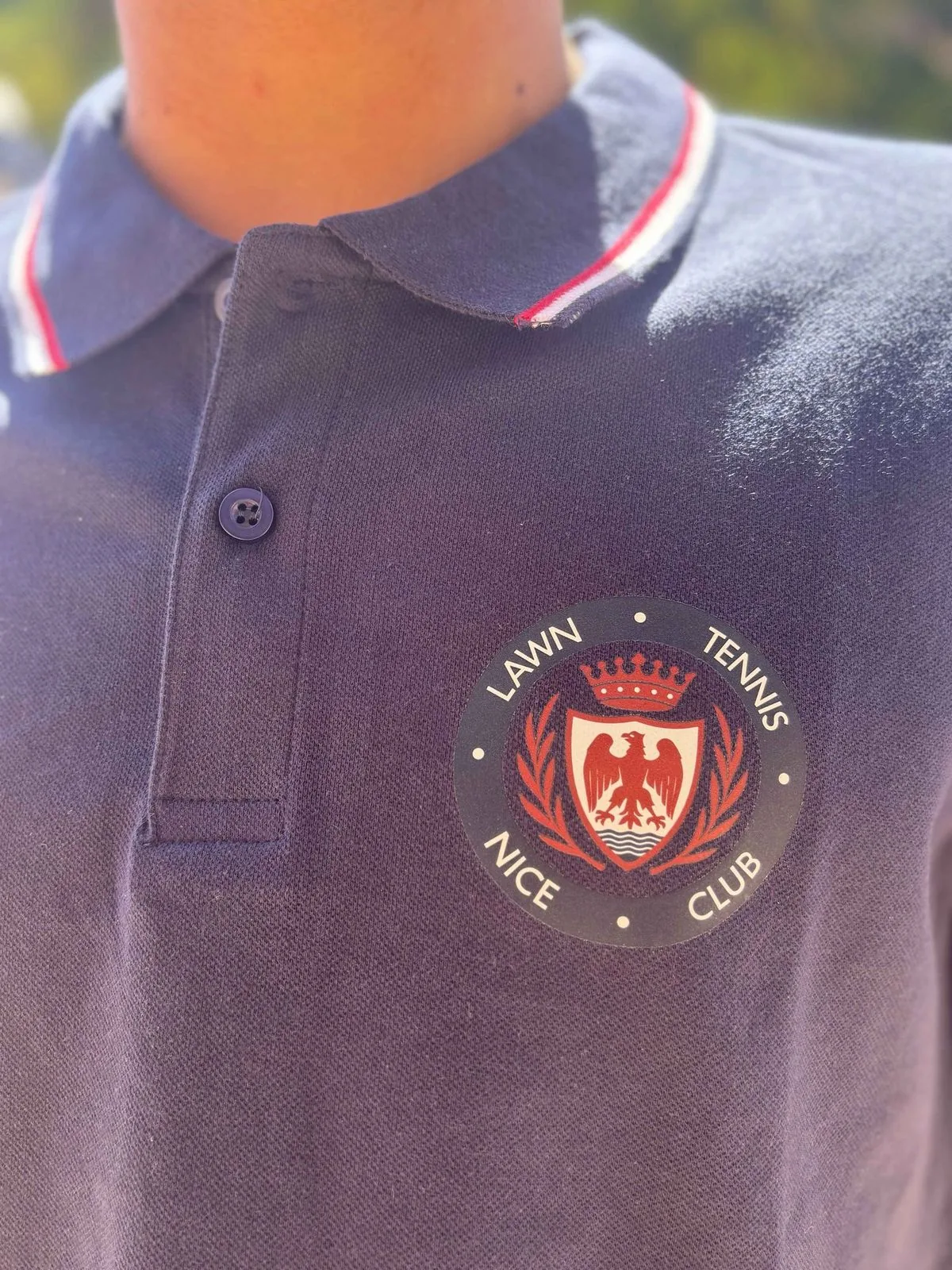 Polo blanc logo Nice LTC